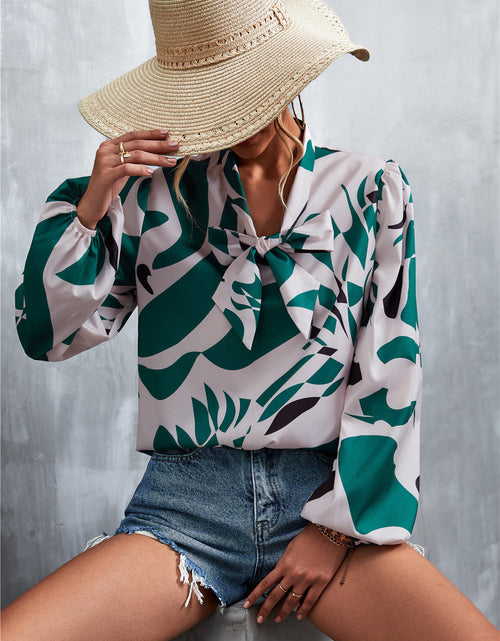 Load image into Gallery viewer, Printed Tie Neck Puff Sleeve Blouse
