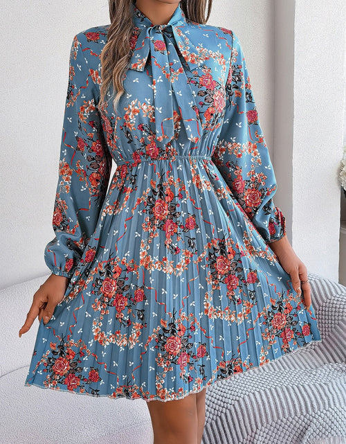 Load image into Gallery viewer, Pleated Printed Tie Neck Long Sleeve Dress
