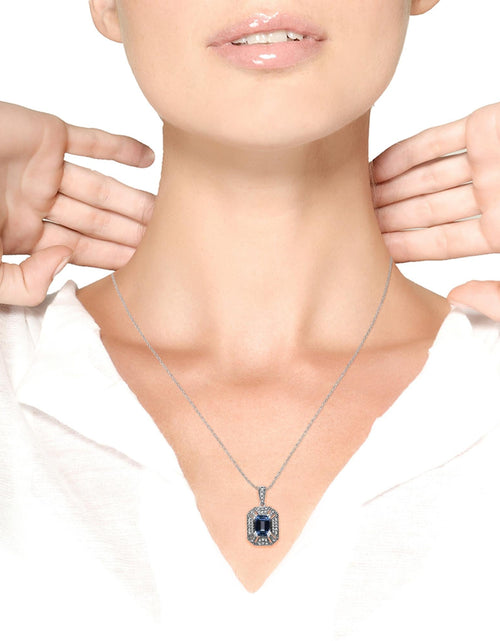 Load image into Gallery viewer, .925 Sterling Silver Blue Topaz and Diamond Accent Art Deco Style 18" Pendant Necklace (I-J Color, I1-I2 Clarity) by Haus of Brilliance
