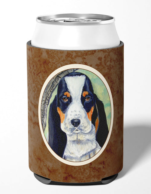 Load image into Gallery viewer, Basset Hound on the branch Can or Bottle Hugger 7002CC by Caroline's Treasures
