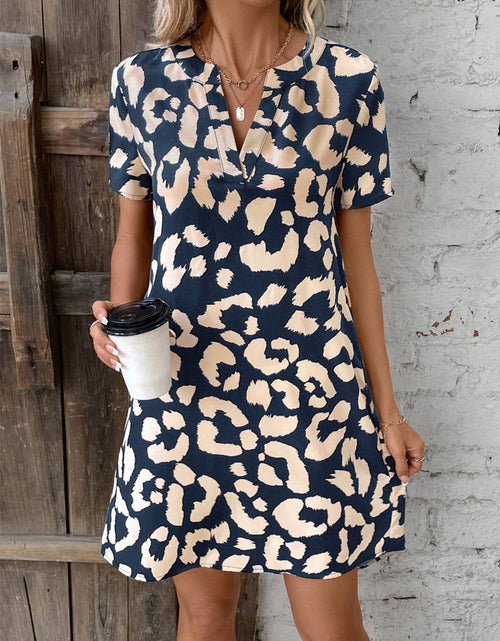 Load image into Gallery viewer, Printed Notched Short Sleeve Mini Dress
