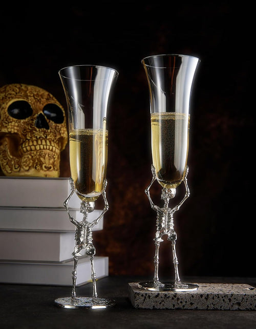Load image into Gallery viewer, Stemmed Skeleton Champagne Flute Glass | Set of 2 | 7.5oz Halloween Skeleton Glasses 10" H, Goth Gifts, Skeleton Gifts, Skeleton Decor, Spooky Wine Gift Set, Perfect for Halloween Themed Parties by The Wine Savant
