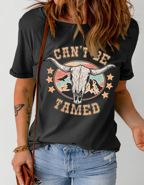 Load image into Gallery viewer, CAN'T BE TAMED Graphic Short Sleeve Tee
