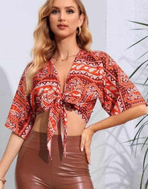 Load image into Gallery viewer, Printed Tie Front Cropped Dolman Sleeve Blouse
