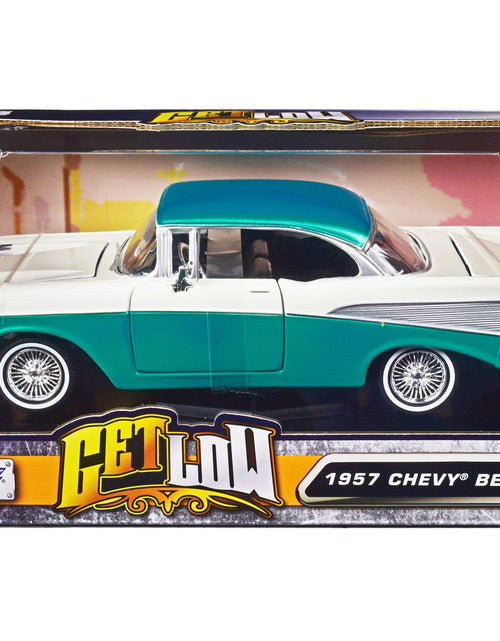 Load image into Gallery viewer, 1957 Chevrolet Bel Air Lowrider Turquoise Metallic and White "Get Low" Series 1/24 Diecast Model Car by Motormax
