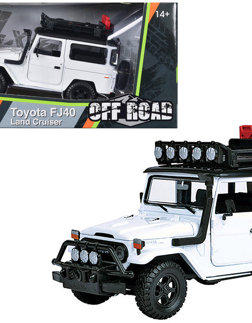 Load image into Gallery viewer, Toyota FJ40 Land Cruiser White "4x4 Overlanders" Series 1/24 Diecast Model Car by Motormax
