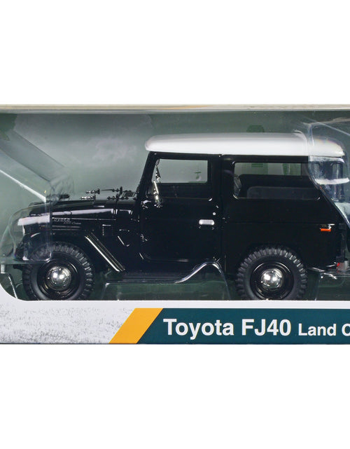 Load image into Gallery viewer, Toyota FJ40 Land Cruiser Black with White Top 1/24 Diecast Model Car by Motormax

