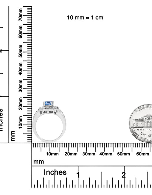 Load image into Gallery viewer, .925 Sterling Silver Diamond Accent and 8X6 mm Emerald-Shape Blue Topaz Ring (I-J Color, I2-I3 Clarity) by Haus of Brilliance
