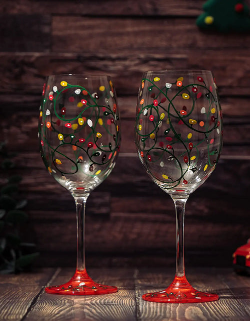 Load image into Gallery viewer, Stemmed Christmas Lights Wine Glasses Set of 2 - Hand Painted Wine Glass Ornament Light Bulbs Glasses, Perfect for Wine, Champagne, Holiday Parties and Festivities - 9.5" High, 21 oz Capacity by The Wine Savant
