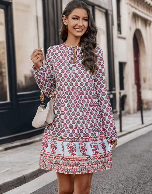 Load image into Gallery viewer, Printed Tie Neck Long Sleeve Dress

