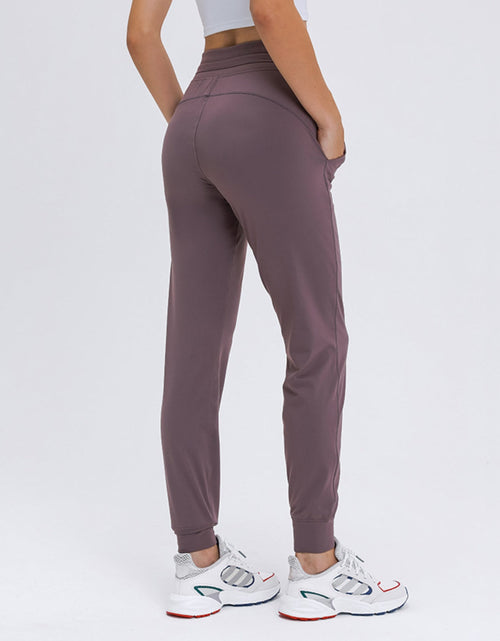 Load image into Gallery viewer, Millennia Double Take Tied Joggers with Pockets
