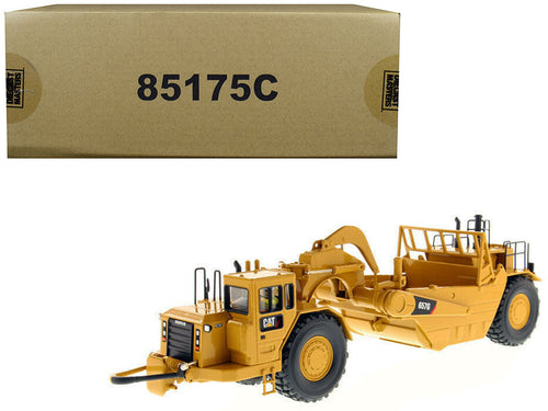 Load image into Gallery viewer, CAT Caterpillar 657 G Wheel Tractor Scraper with Operator "Core Classics Series" 1/50 Diecast Model by Diecast Masters
