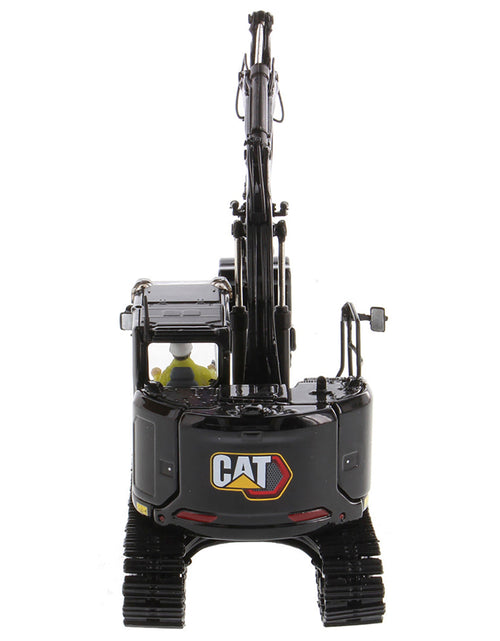 Load image into Gallery viewer, CAT Caterpillar 315 Track Type Hydraulic Excavator Special Black Finish with Operator "High Line" Series 1/50 Diecast Model by Diecast Masters

