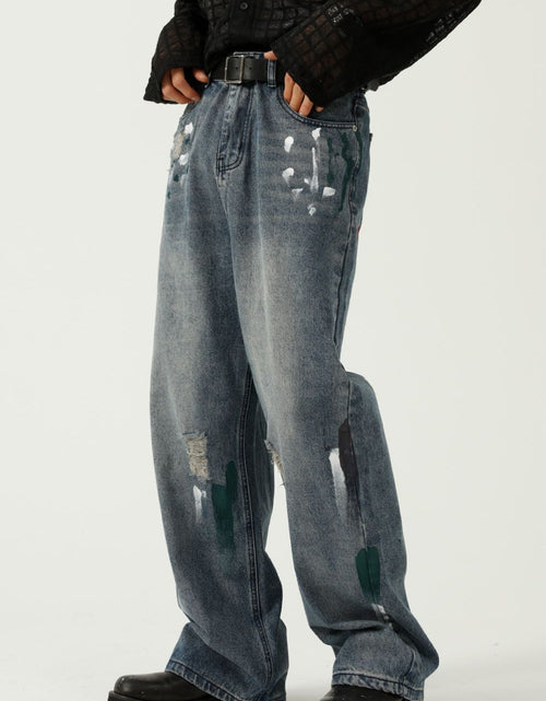 Load image into Gallery viewer, Washed Distressed Wide-Leg Jeans
