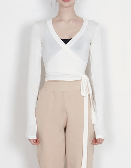 Load image into Gallery viewer, Tied Surplice Long Sleeve Top

