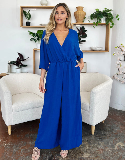 Load image into Gallery viewer, Double Take Full Size Surplice Wide Leg Jumpsuit with Pockets
