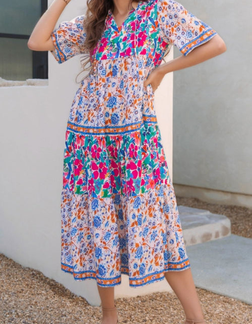 Load image into Gallery viewer, Mixed Floral Print Tie Neck Short Sleeve Dress
