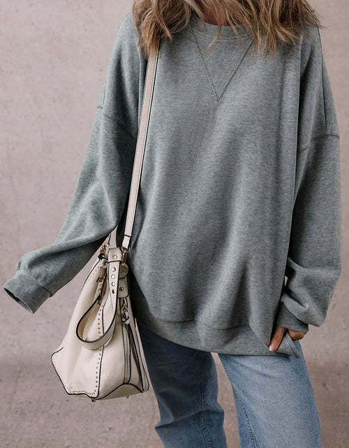 Load image into Gallery viewer, Slit Round Neck Long Sleeve Sweatshirt
