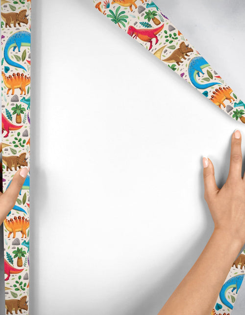 Load image into Gallery viewer, Dinosaurs Kid's Gift Wrap by Present Paper
