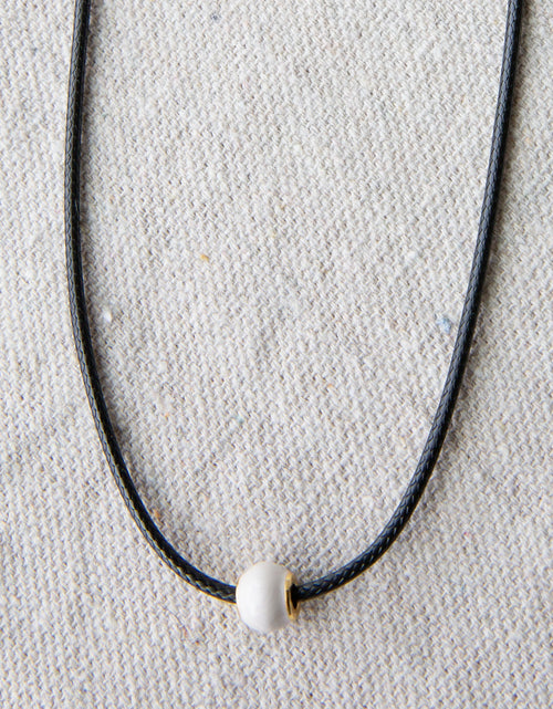 Load image into Gallery viewer, Pearl and Cord Necklace
