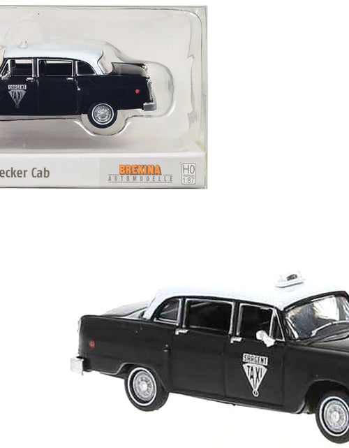 Load image into Gallery viewer, 1974 Checker Cab Black and White "Winnipeg" 1/87 (HO) Scale Model Car by Brekina
