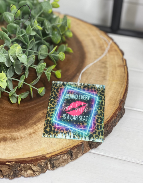 Load image into Gallery viewer, Behind Every Bad B**** Car Freshener by CMD Wholesale
