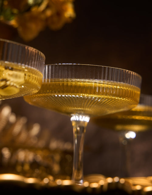 Load image into Gallery viewer, Ribbed Coupe Cocktail Glasses 8 oz | Set of 4 | Classic Manhattan Glasses For Cocktails, Champagne Coupe, Ripple Coupe Glasses, Art Deco Gatsby Vintage, Crystal with Stems (Clear) by The Wine Savant
