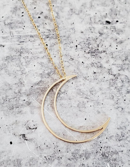Load image into Gallery viewer, Crescent Moon Gold Necklace by Salt and Sparkle

