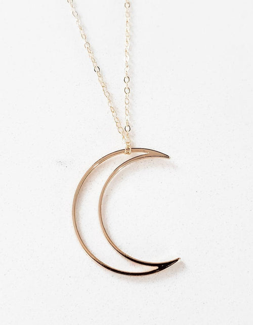 Load image into Gallery viewer, Crescent Moon Gold Necklace by Salt and Sparkle
