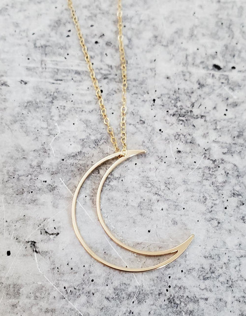 Load image into Gallery viewer, Crescent Moon Gold Necklace by Salt and Sparkle
