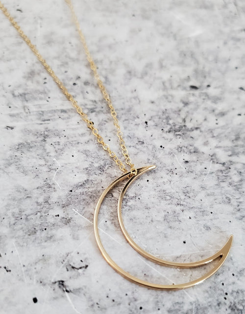 Load image into Gallery viewer, Crescent Moon Gold Necklace by Salt and Sparkle
