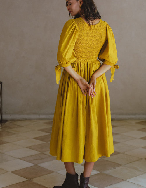 Load image into Gallery viewer, Freya Smocked Linen Midi Dress by ELF
