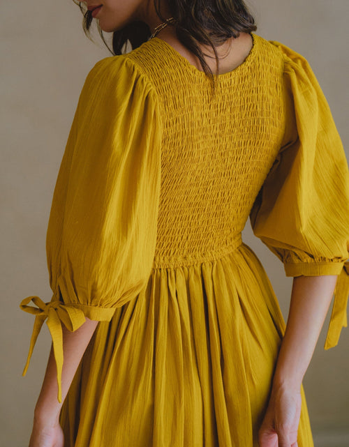 Load image into Gallery viewer, Freya Smocked Linen Midi Dress by ELF
