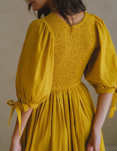 Load image into Gallery viewer, Freya Smocked Linen Midi Dress by ELF
