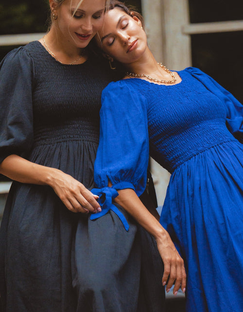 Load image into Gallery viewer, Freya Smocked Linen Midi Dress by ELF
