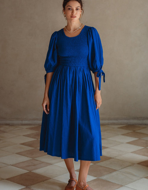 Load image into Gallery viewer, Freya Smocked Linen Midi Dress by ELF
