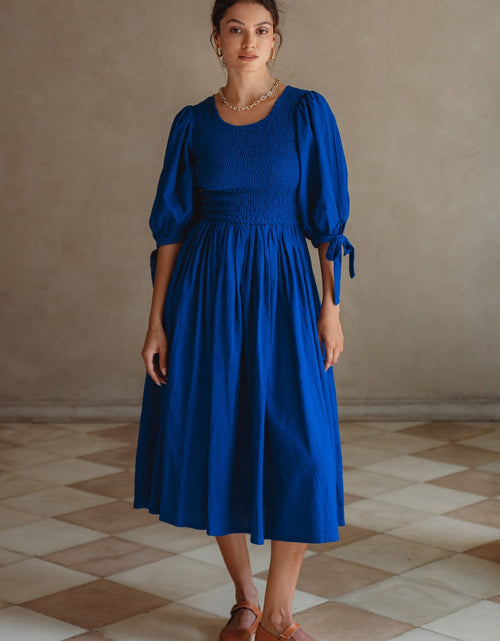 Load image into Gallery viewer, Freya Smocked Linen Midi Dress by ELF
