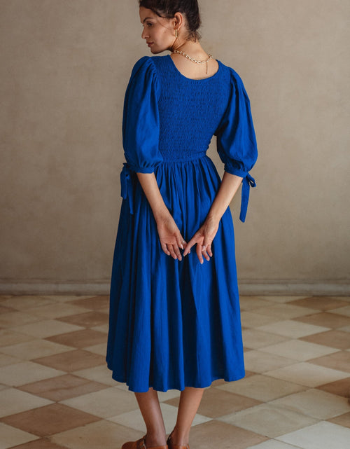 Load image into Gallery viewer, Freya Smocked Linen Midi Dress by ELF
