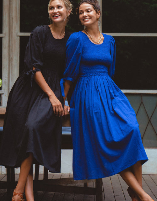 Load image into Gallery viewer, Freya Smocked Linen Midi Dress by ELF
