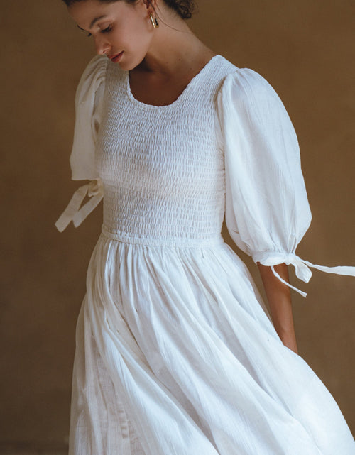 Load image into Gallery viewer, Freya Smocked Linen Midi Dress by ELF
