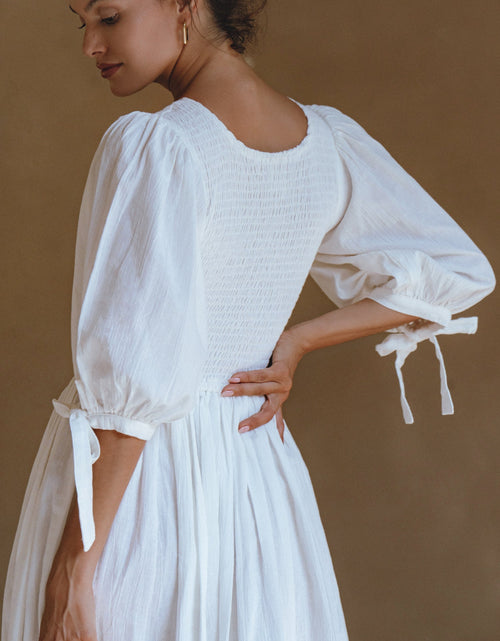 Load image into Gallery viewer, Freya Smocked Linen Midi Dress by ELF

