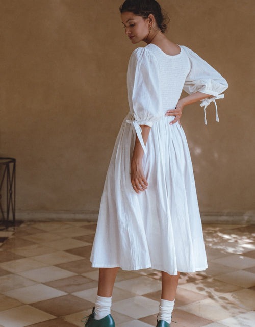 Load image into Gallery viewer, Freya Smocked Linen Midi Dress by ELF
