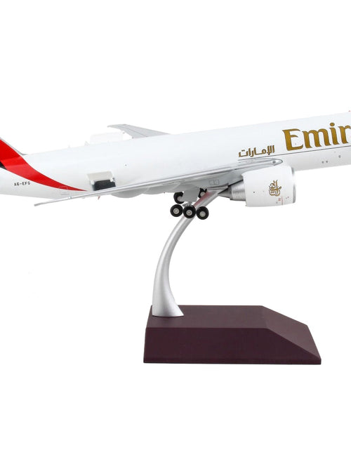 Load image into Gallery viewer, Boeing 777F Commercial Aircraft "Emirates Airlines - SkyCargo" White with Striped Tail "Gemini 200 - Interactive" Series 1/200 Diecast Model Airplane by GeminiJets
