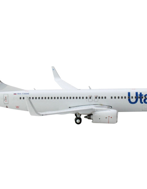 Load image into Gallery viewer, Boeing 737-800 Commercial Aircraft "Utair" White with Blue Tail Stripes 1/400 Diecast Model Airplane by GeminiJets
