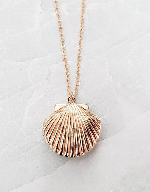 Load image into Gallery viewer, Gold Seashell Locket by Salt and Sparkle
