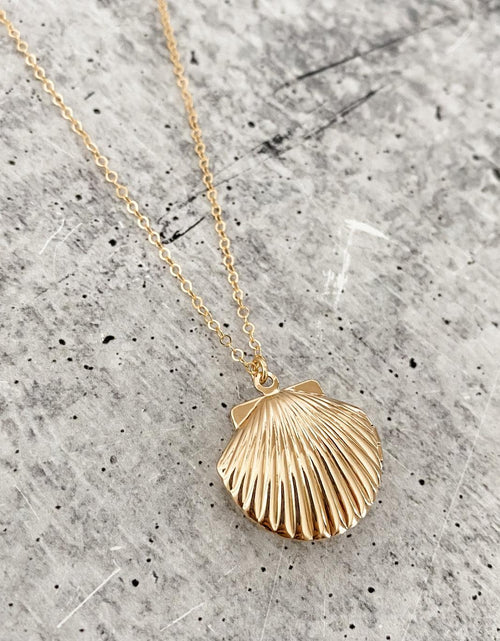 Load image into Gallery viewer, Gold Seashell Locket by Salt and Sparkle
