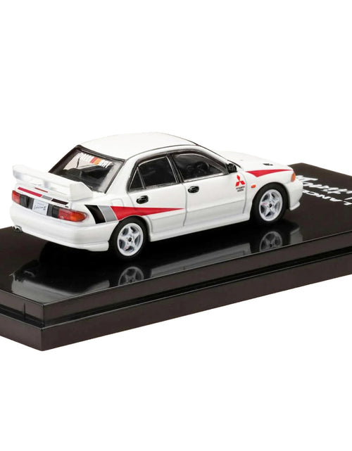 Load image into Gallery viewer, Mitsubishi Lancer RS Evolution III RHD (Right Hand Drive) Scortia White with Red Rally Stripes 1/64 Diecast Model Car by Hobby Japan
