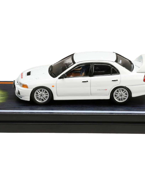 Load image into Gallery viewer, Mitsubishi Lancer RS Evolution IV RHD (Right Hand Drive) White "Monstar" with Seiji Iwaki Driver Figure "Initial D" (1995-2013) Manga 1/64 Diecast Model Car by Hobby Japan
