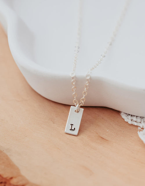 Load image into Gallery viewer, Initial Tiny Rectangle Tag Necklace by Salt and Sparkle
