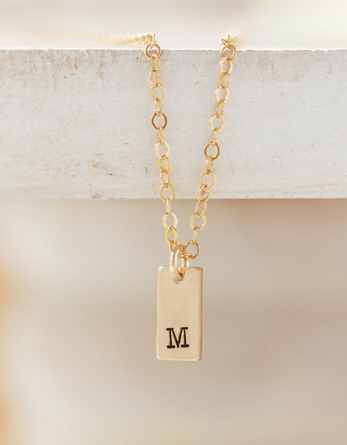 Load image into Gallery viewer, Initial Tiny Rectangle Tag Necklace by Salt and Sparkle
